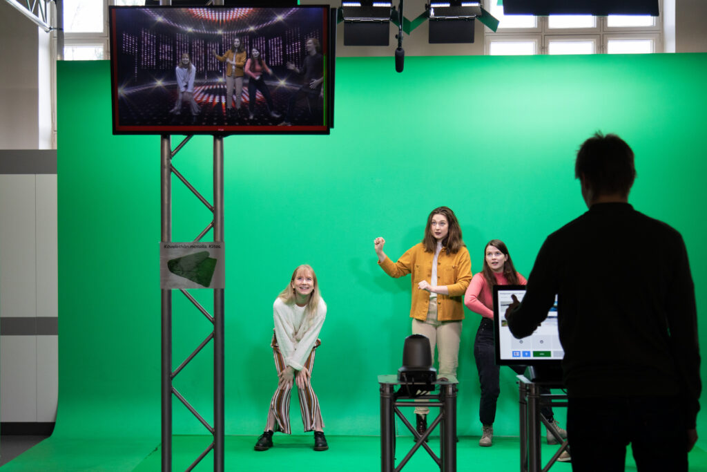 Visitors testing the green screen of Mastola.
